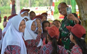 Senyum Ceria Siswa SD Sambut Hangat Satgas Kodim 0204/DS di Lokasi TMMD 126 Sergai