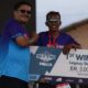 Togap Serahkan Piala Pemenang Lari Lintas Alam Trail of The Kings Danau Toba