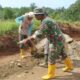 Satgas TMMD Kodim DS Laksanakan Finishing Jalan dengan Pembersihan Material