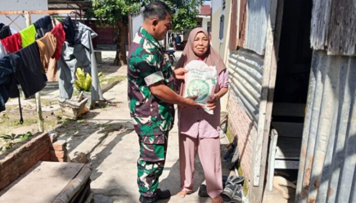 Koramil 14/DMR Salurkan Bantuan Sembako kepada Warga Desa Dolok Merawan