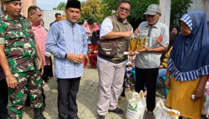 Babinsa Hadiri Pembagian Sembako oleh Walikota Tebingtinggi