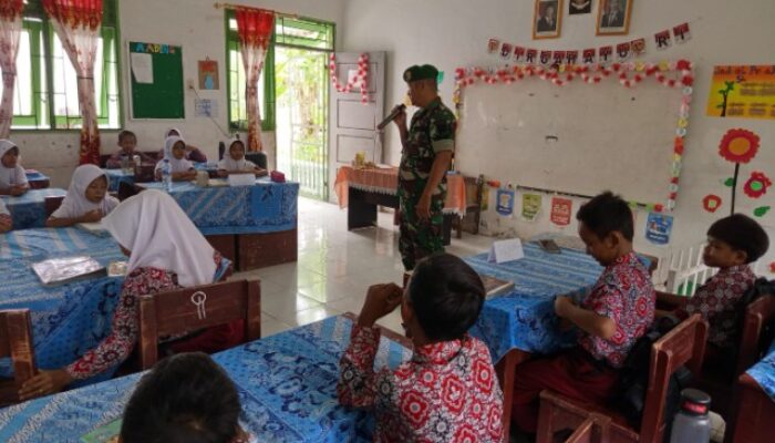 Babinsa Kodim DS Gelorakan Cinta Negeri di Pantai Cermin