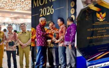 Raih Predikat Informatif, Kadis Kominfo Medan Arrahmaan Pane Terima Penghargaan KI Sumut Award 2026